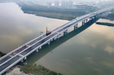 中新天津生态城首条西向通道 塘汉公路联络线跨蓟运河桥通车